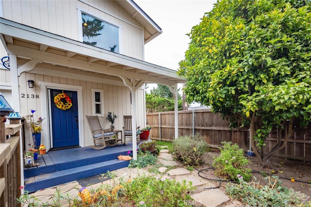 2138 Wilton Drive Cambria, CA 93428 - Photo 3 of 37 a view of a chair and table in backyard of the house