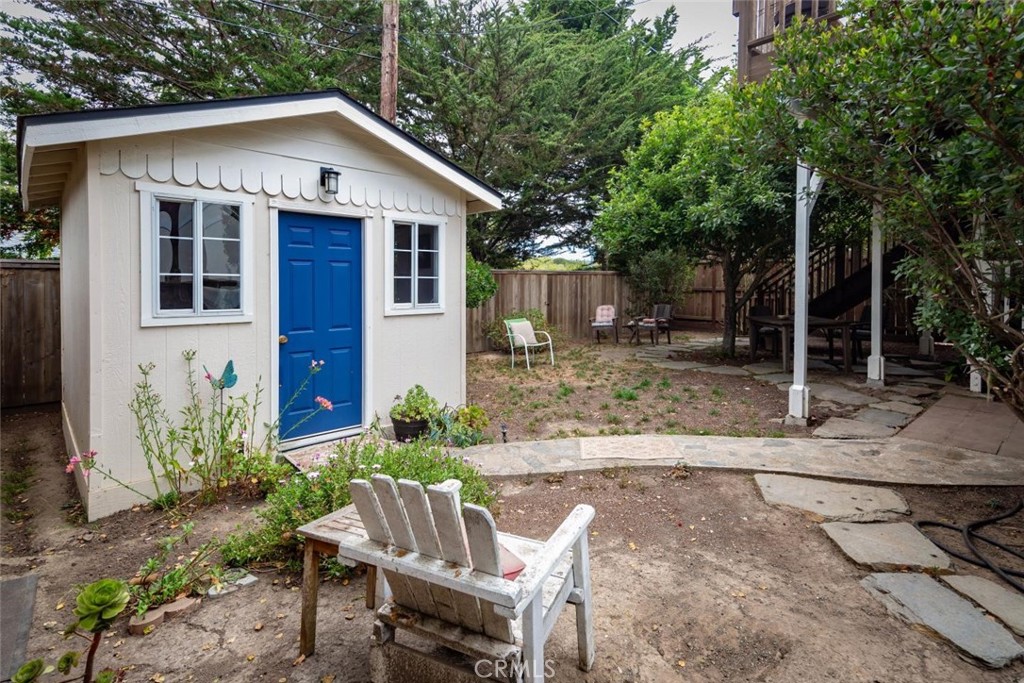 2138 Wilton Drive Cambria, CA 93428 - Photo 35 of 37 a view of a house with backyard and sitting area