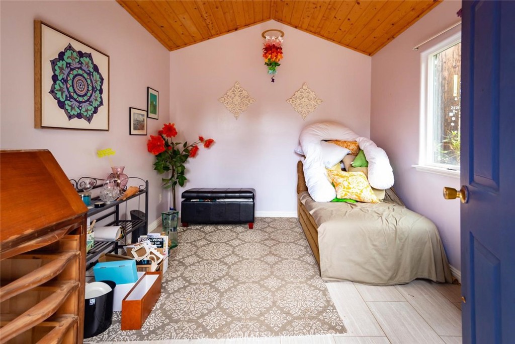 2138 Wilton Drive Cambria, CA 93428 - Photo 37 of 37 a bedroom with a bed and wooden floor