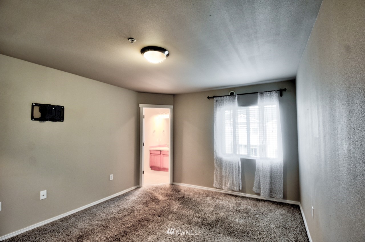 5305 Military Road East, Unit G Tacoma, WA 98446 - Photo 15 of 22 a view of livingroom with window