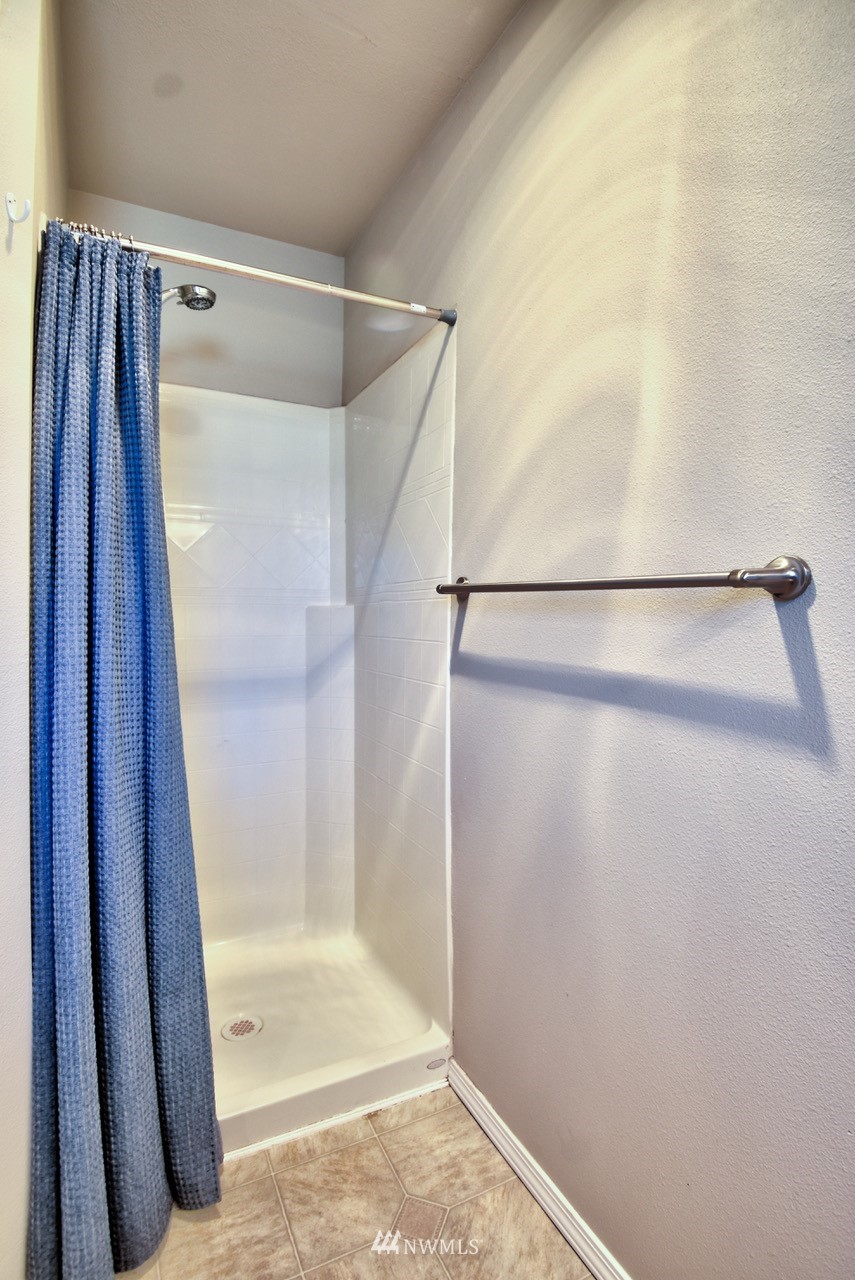 5305 Military Road East, Unit G Tacoma, WA 98446 - Photo 18 of 22 a view of walk in closet