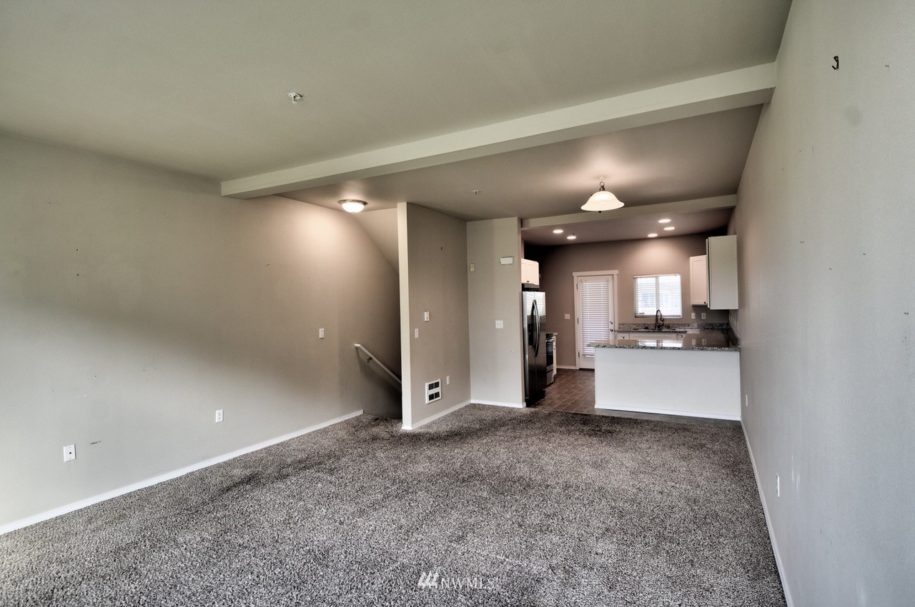 5305 Military Road East, Unit G Tacoma, WA 98446 - Photo 2 of 22 a view of a hallway