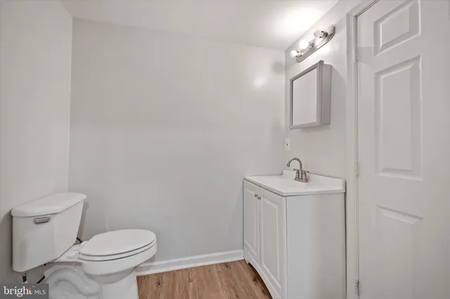 an aerial view of residential house with outdoor space and trees all around