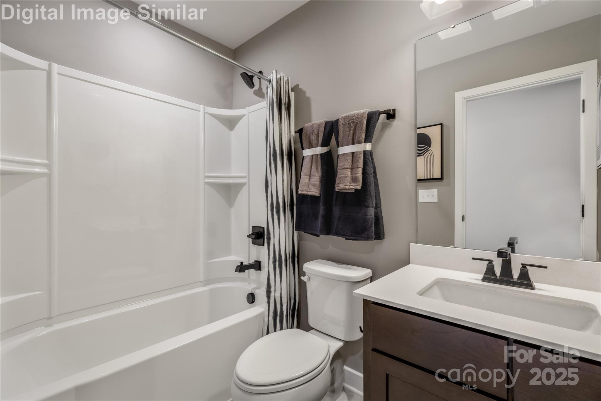 9551 Teamwork Street Northwest Concord, NC 28027 - Photo 14 of 23 a bathroom with a sink toilet and shower