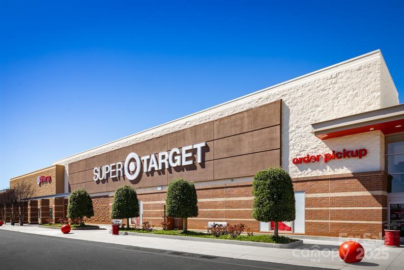 9551 Teamwork Street Northwest Concord, NC 28027 - Photo 22 of 23 a view of a street with cars