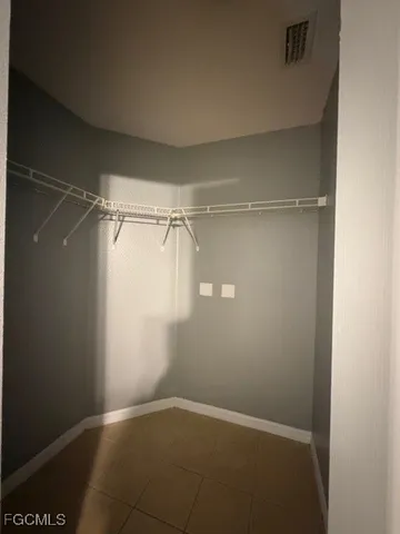 a view of a room with an empty space