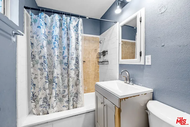 a bathroom with a sink and a toilet