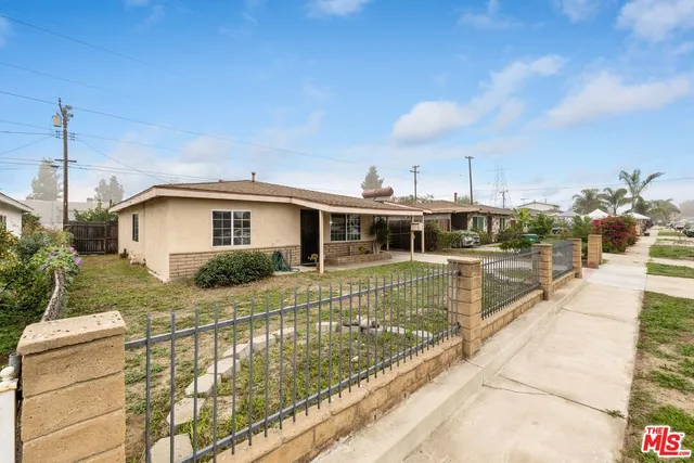 a view of a house with a swimming pool