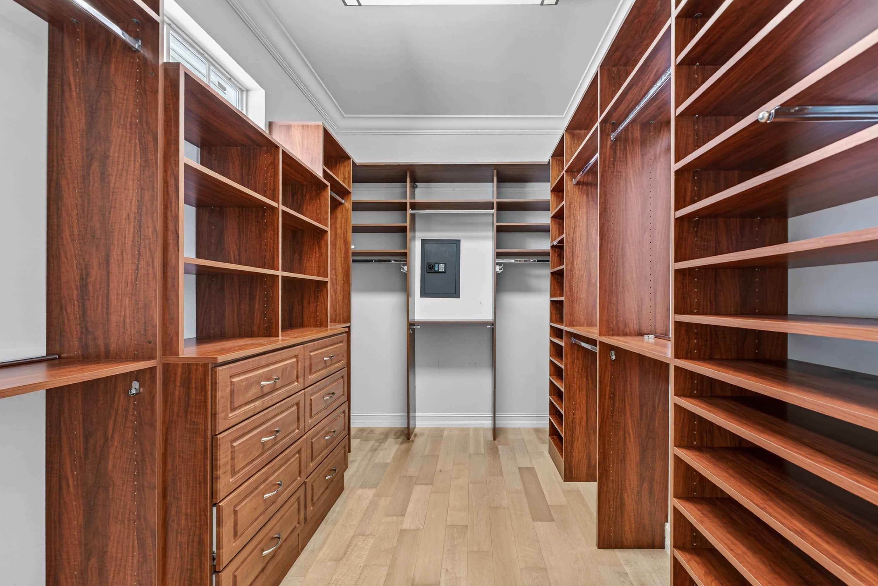 2920 Spanish River Road Boca Raton, FL 33432 - Photo 33 of 75 a view of walk in closet with empty racks
