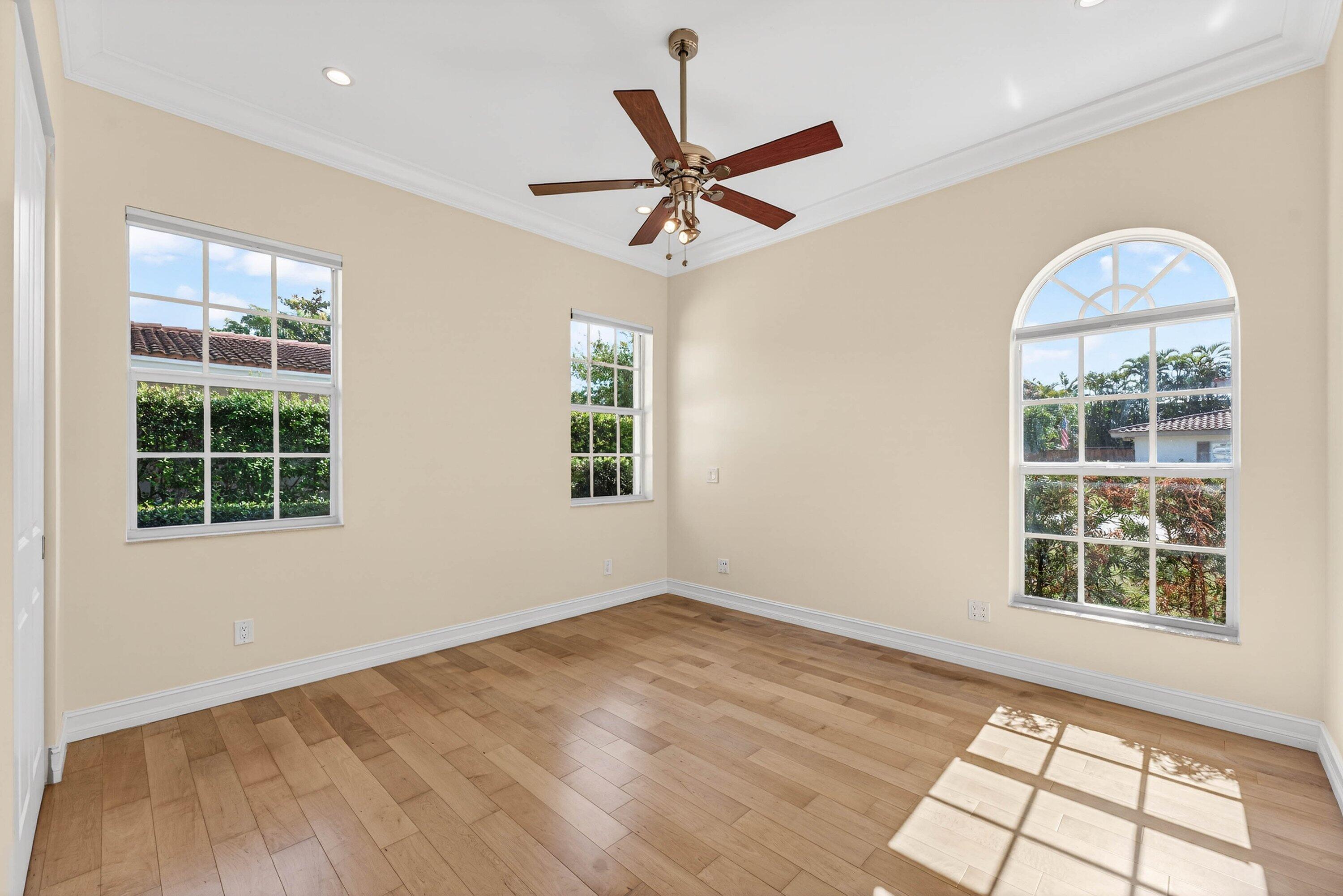 2920 Spanish River Road Boca Raton, FL 33432 - Photo 39 of 75 an empty room with windows and closet
