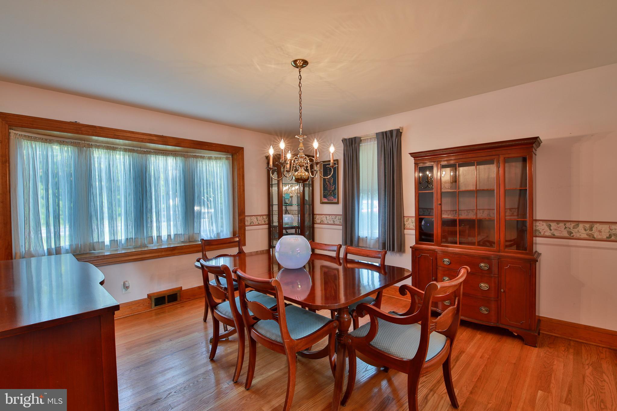 9922 Philadelphia Road Baltimore, MD 21237 - Photo 12 of 44 Dining room with large windows.