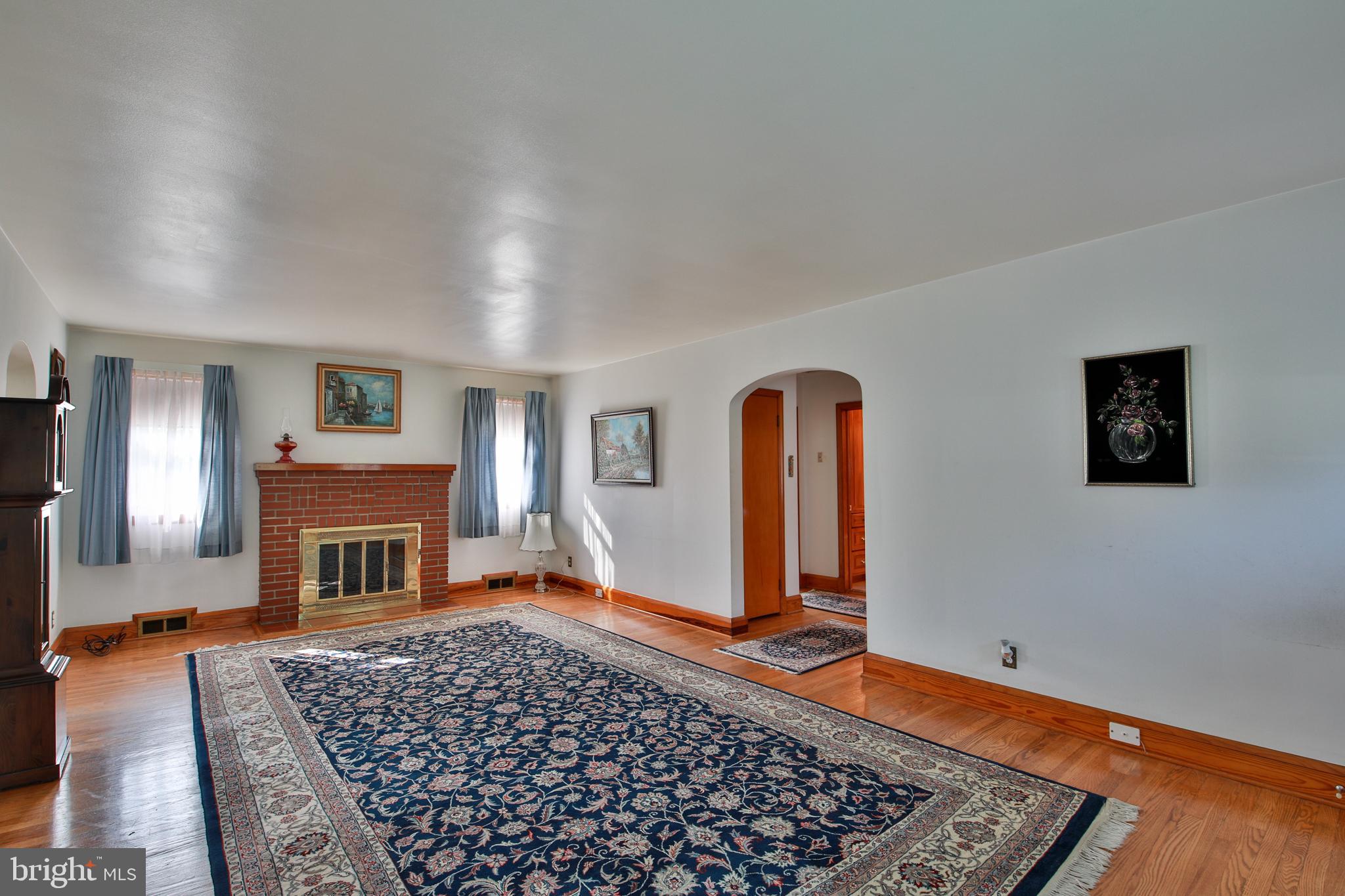 9922 Philadelphia Road Baltimore, MD 21237 - Photo 15 of 44 Large living room with fireplace