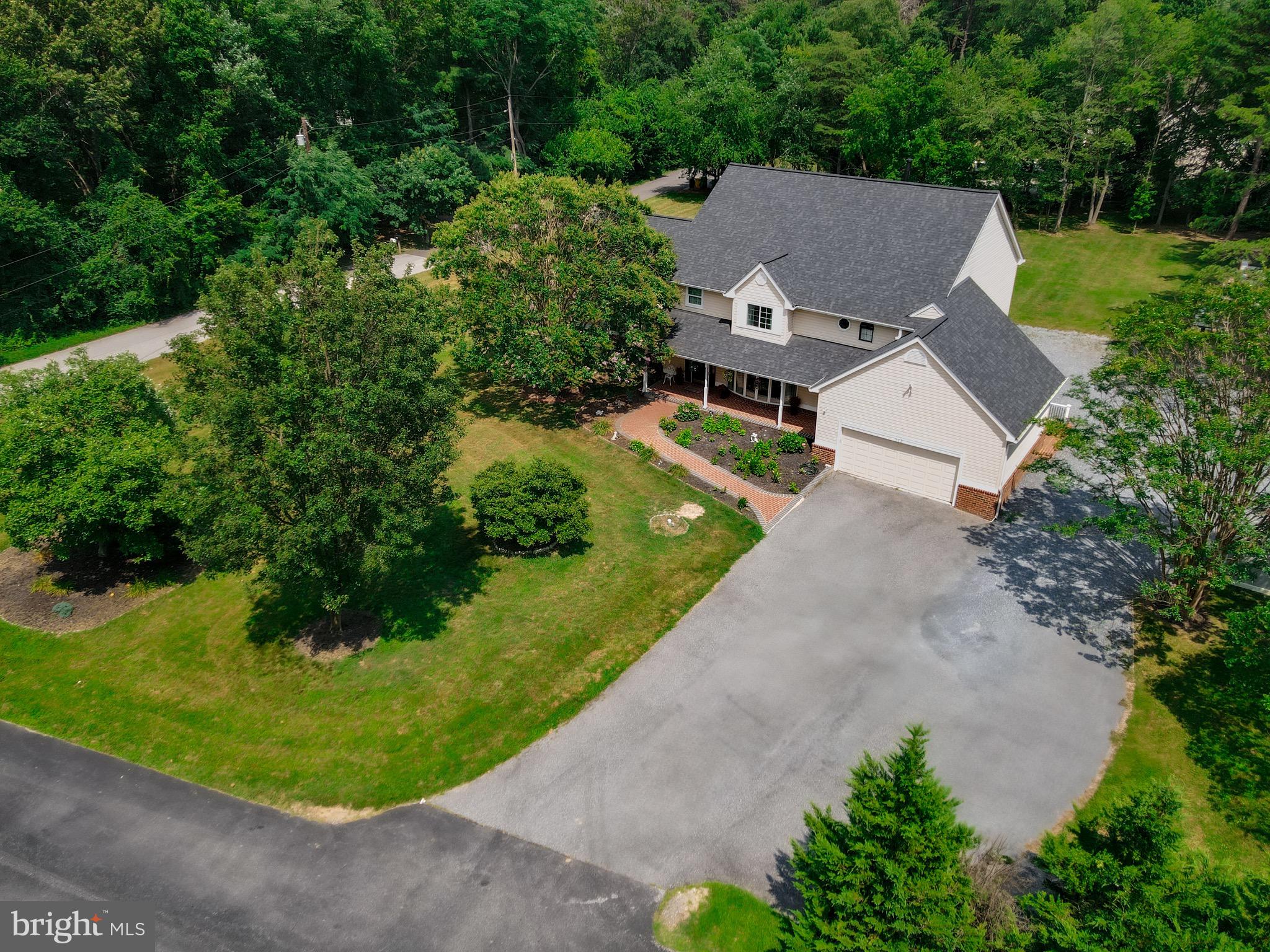 911 South Wieker Road Severn, MD 21144 - Photo 16 of 73 an aerial view of a house with garden