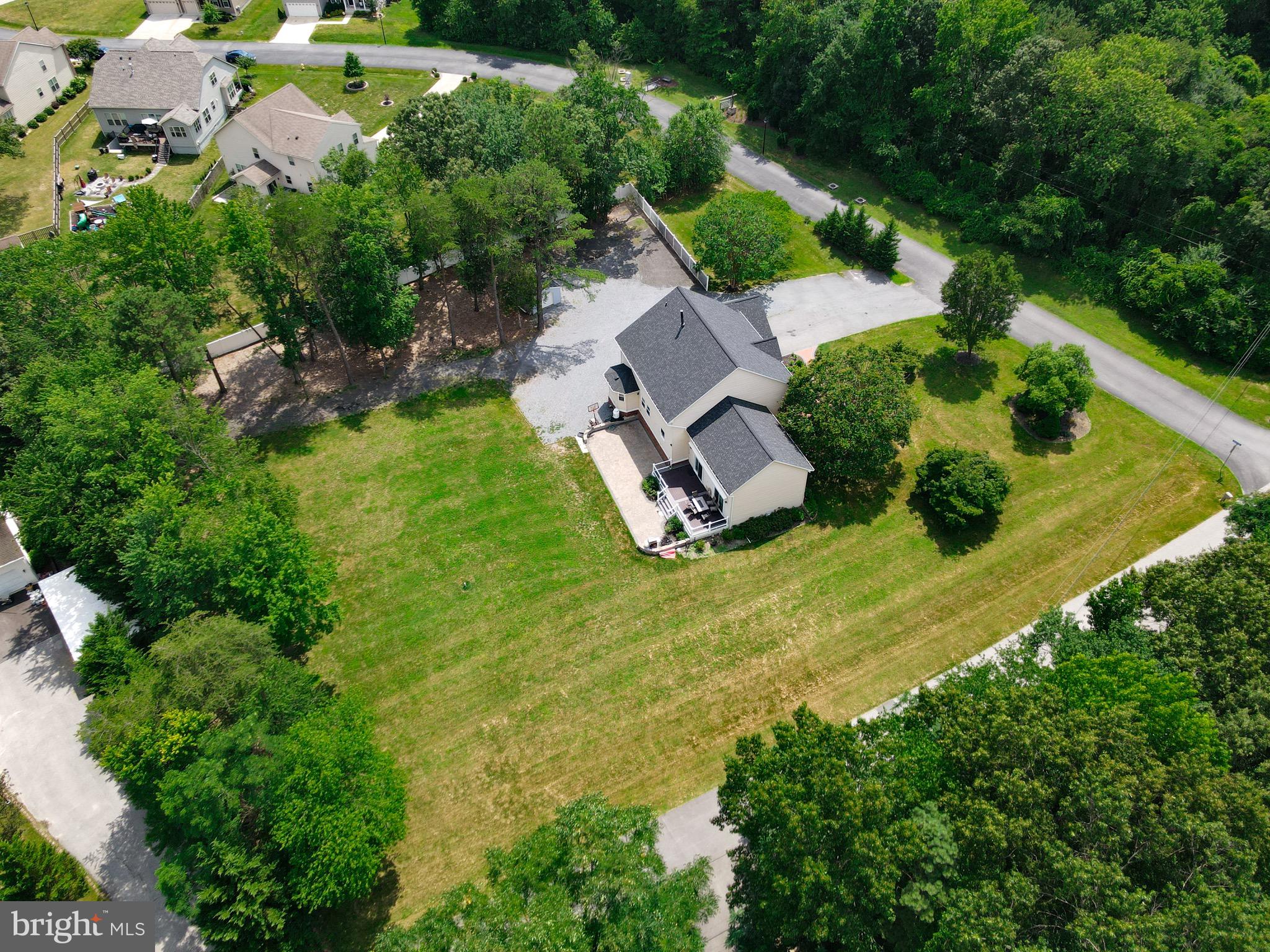 911 South Wieker Road Severn, MD 21144 - Photo 18 of 73 an aerial view of a house with garden space and street view