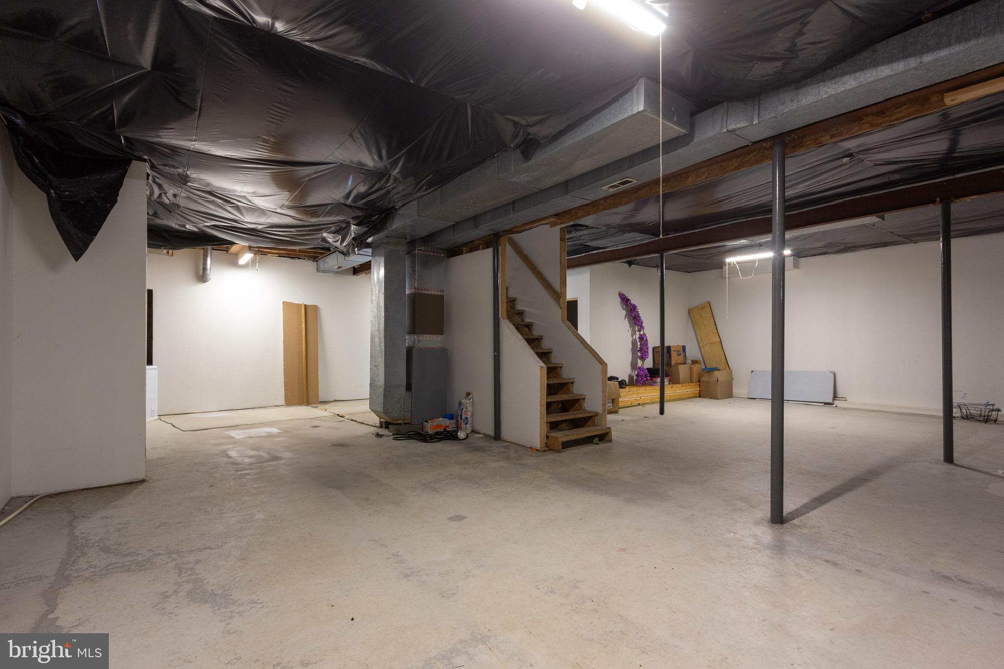 911 South Wieker Road Severn, MD 21144 - Photo 66 of 73 a view of empty room with wooden floor