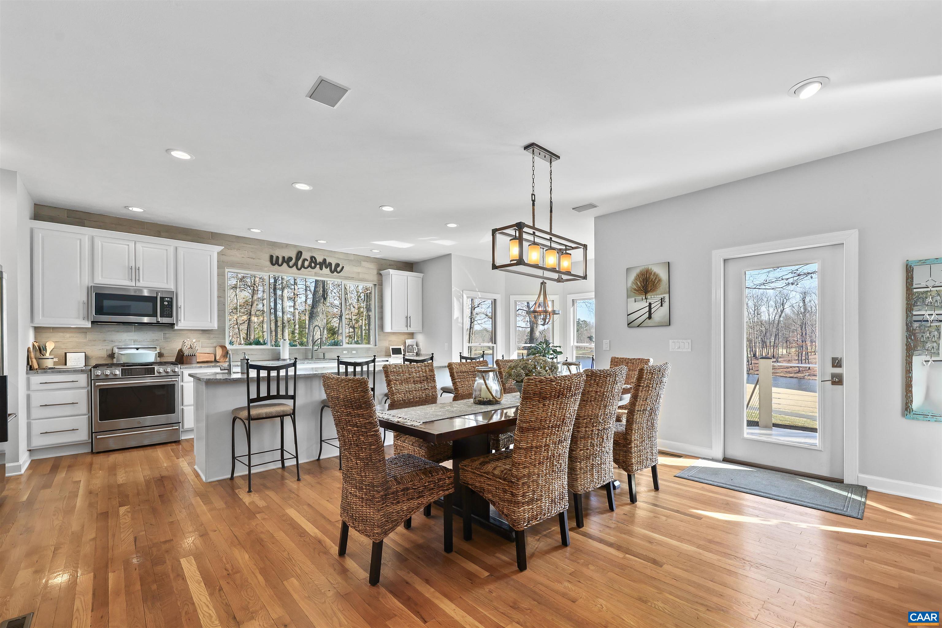 16 Oak Grove Road Palmyra, VA 22963 - Photo 15 of 53 a view of a dining room with furniture window and wooden floor