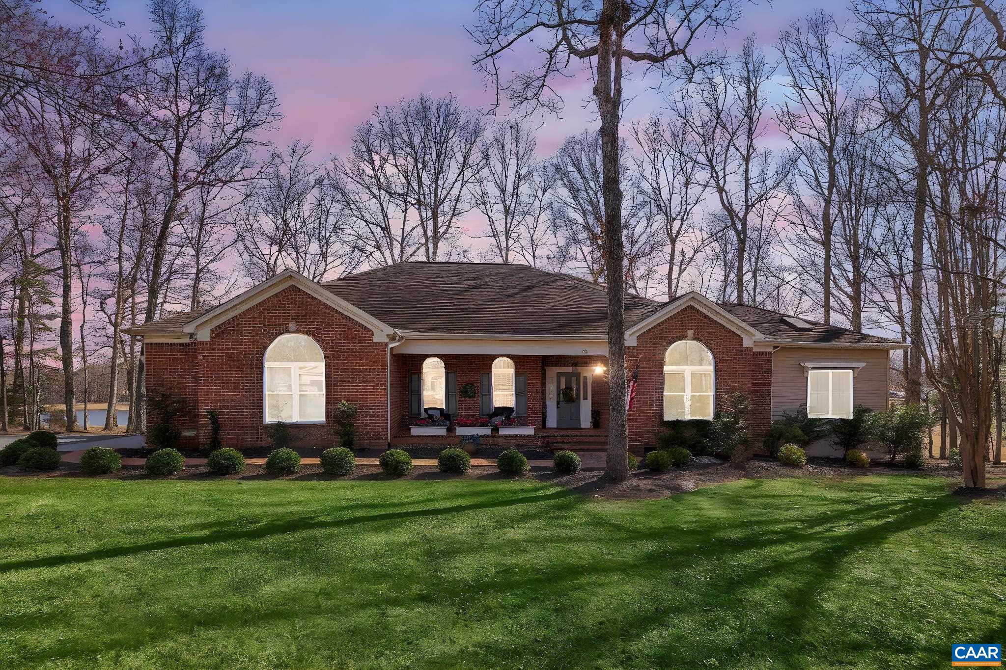 16 Oak Grove Road Palmyra, VA 22963 - Photo 2 of 53 a front view of house with yard and green space