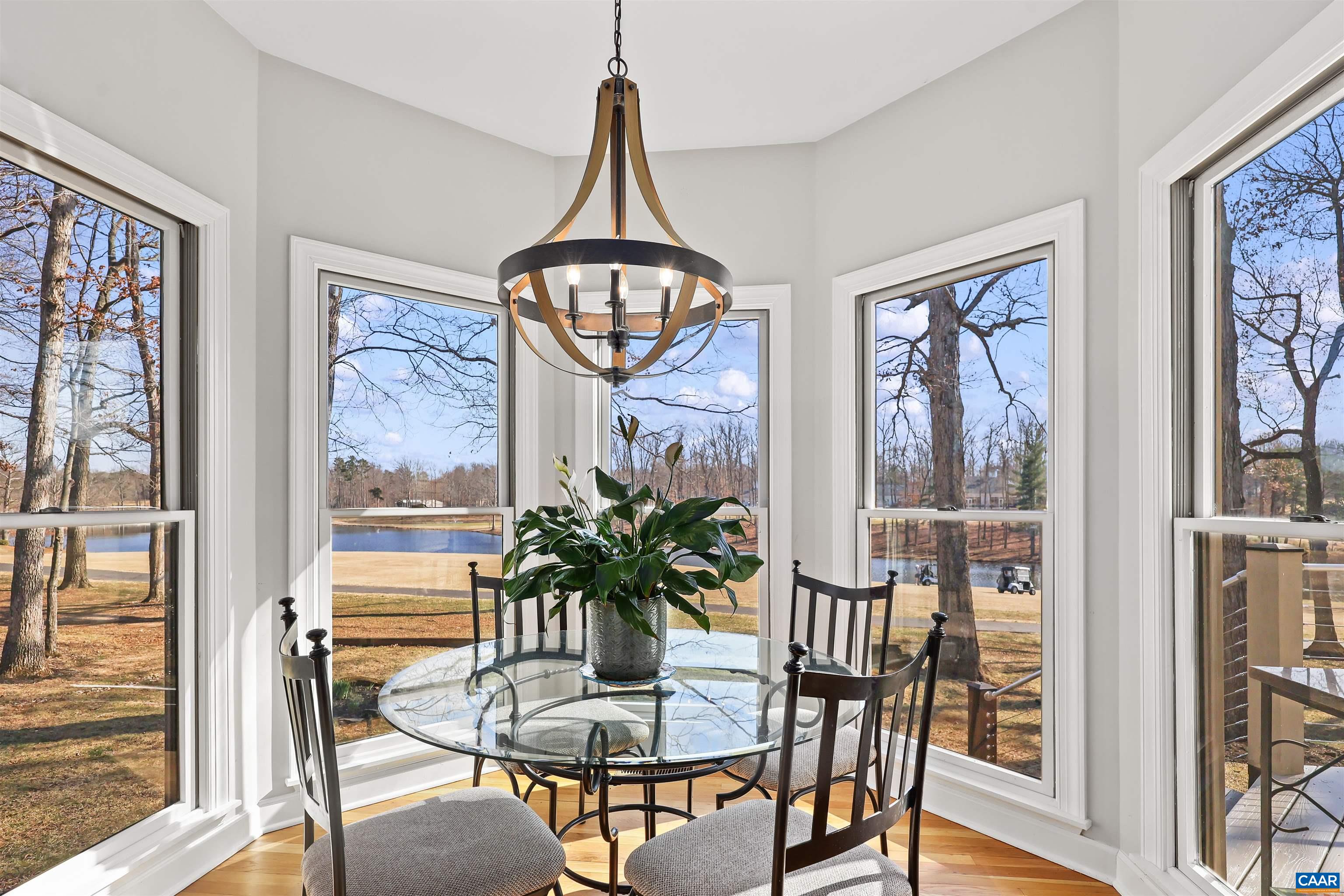 16 Oak Grove Road Palmyra, VA 22963 - Photo 21 of 53 a dining room with furniture a livingroom and a chandelier