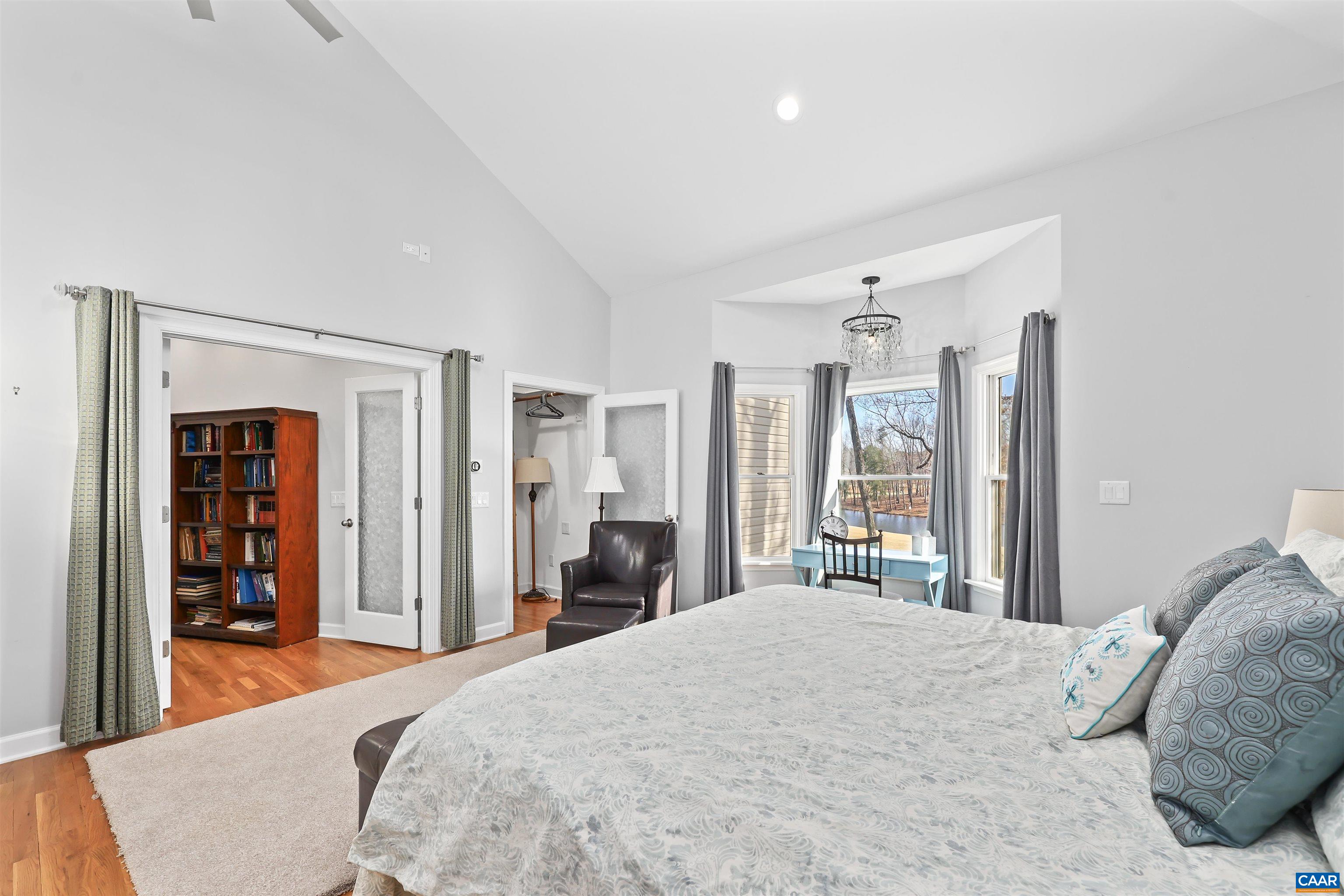 16 Oak Grove Road Palmyra, VA 22963 - Photo 29 of 53 a bedroom with a large bed and a large window
