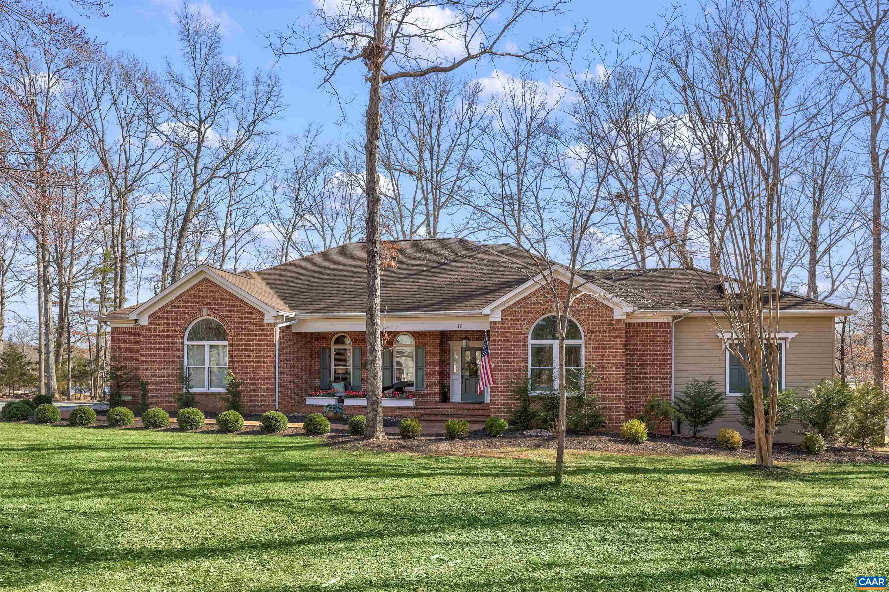 16 Oak Grove Road Palmyra, VA 22963 - Photo 3 of 53 a front view of a house with a garden