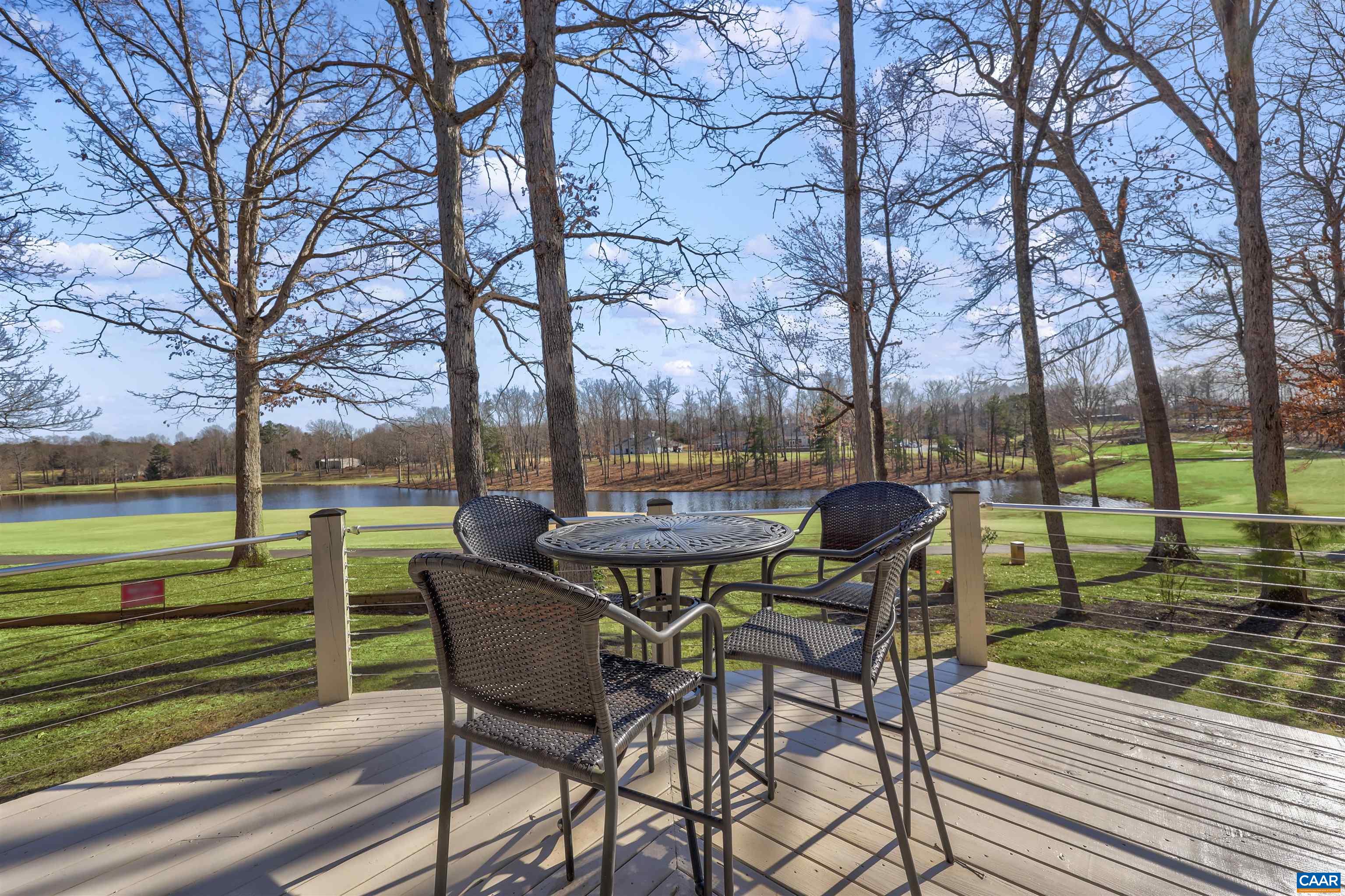 16 Oak Grove Road Palmyra, VA 22963 - Photo 40 of 53 a view of a chair and table on the wooden floor