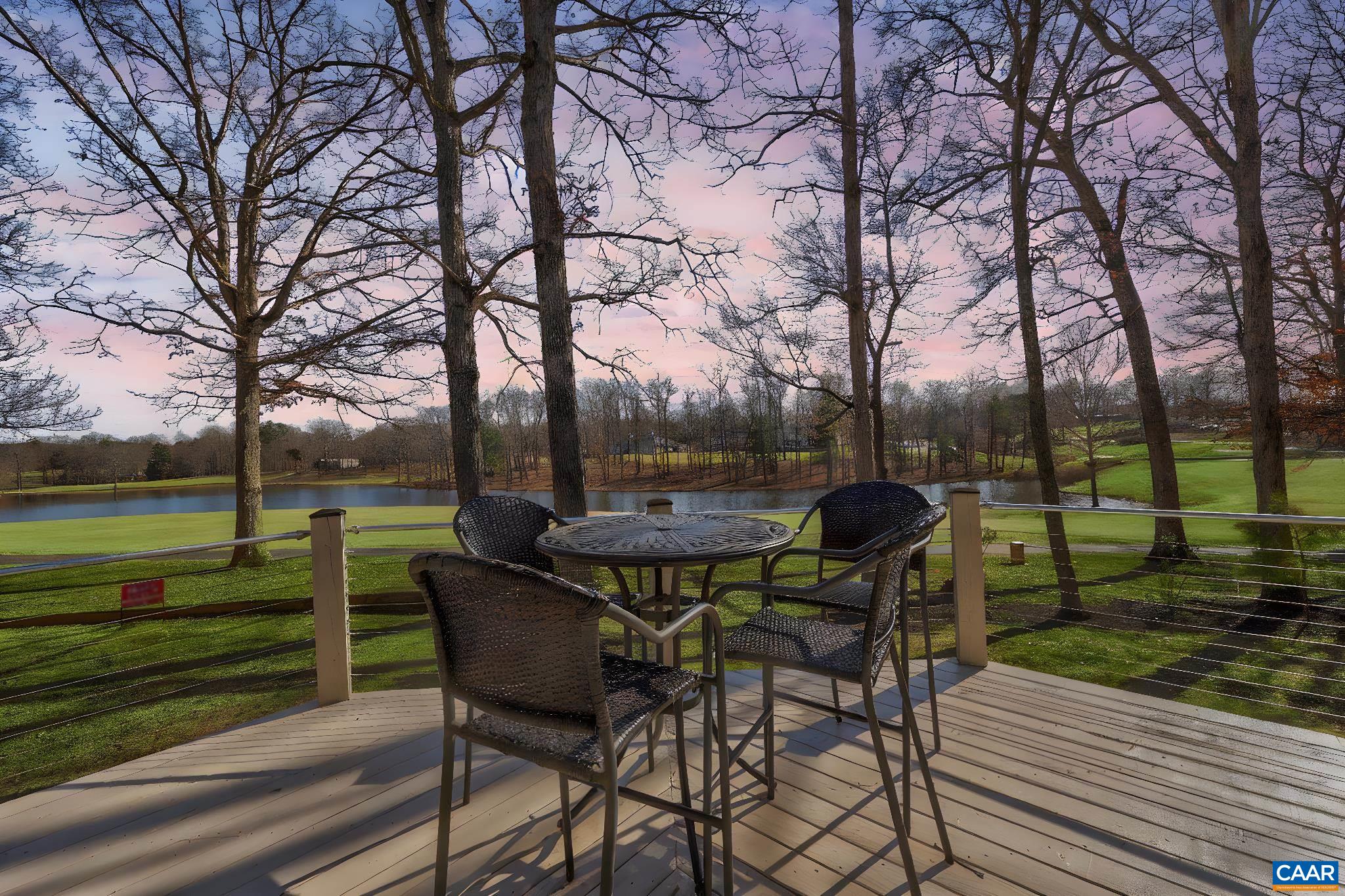 16 Oak Grove Road Palmyra, VA 22963 - Photo 41 of 53 a view of a table and chairs on the roof deck