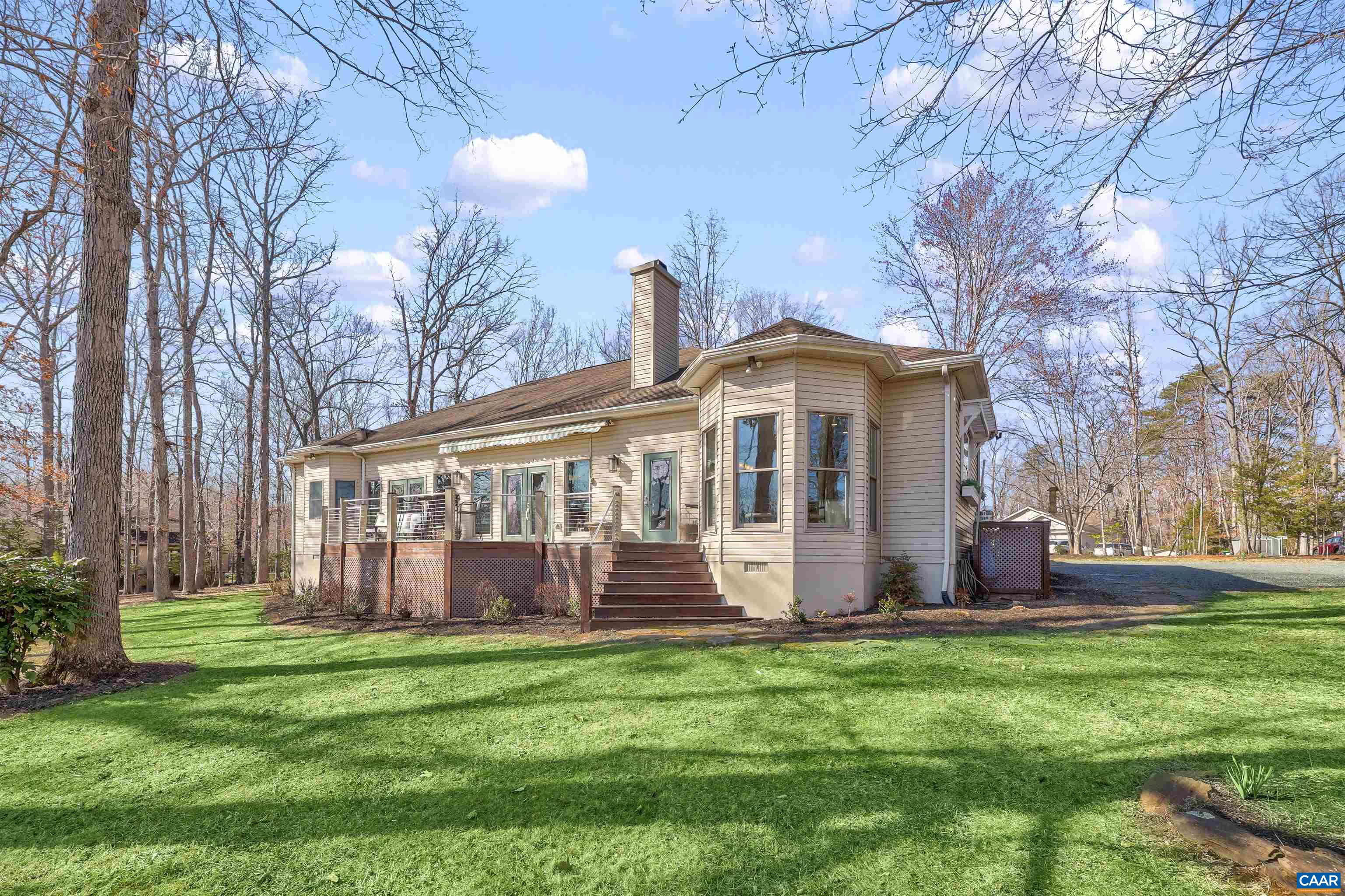 16 Oak Grove Road Palmyra, VA 22963 - Photo 43 of 53 a front view of house with yard and seating area