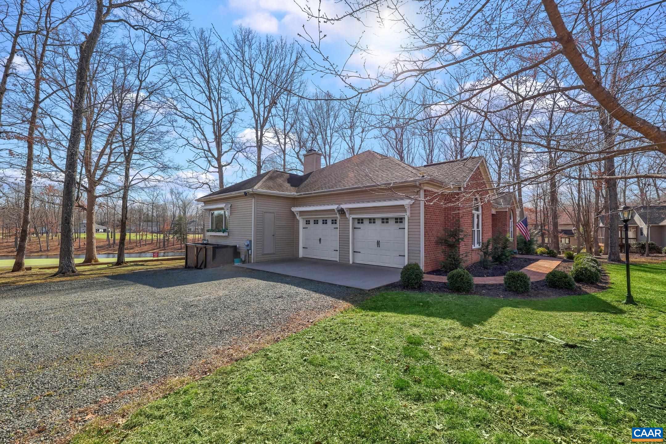 16 Oak Grove Road Palmyra, VA 22963 - Photo 45 of 53 a front view of a house with garden