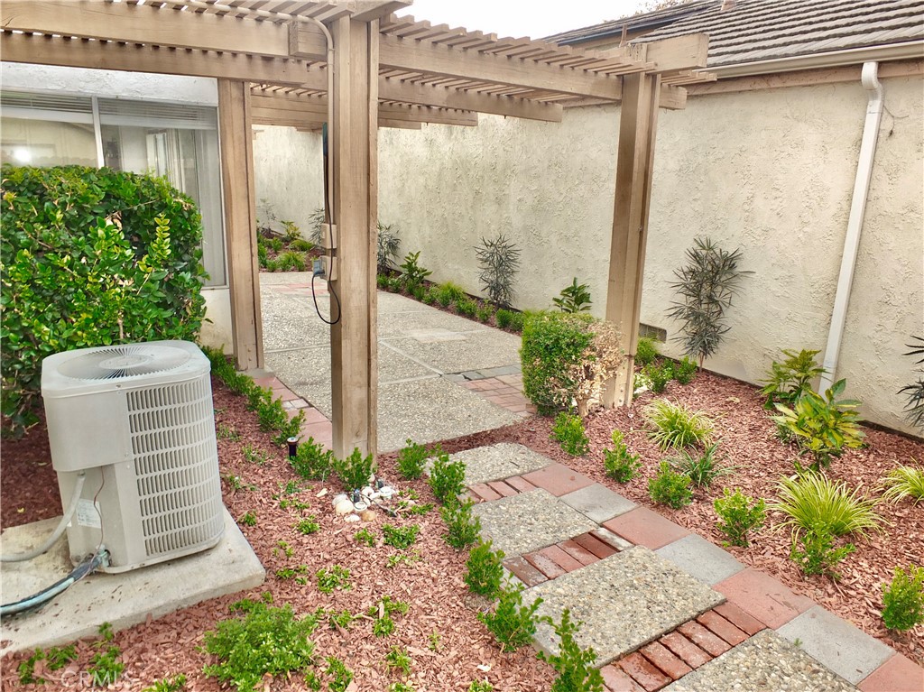 14431 Raintree Road Tustin, CA 92780 - Photo 21 of 53 a view of balcony with potted plants