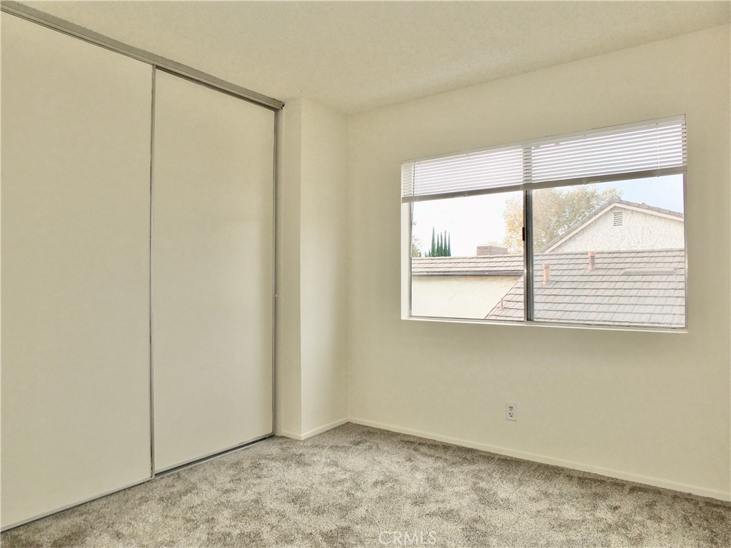 14431 Raintree Road Tustin, CA 92780 - Photo 31 of 53 a view of an empty room with a window