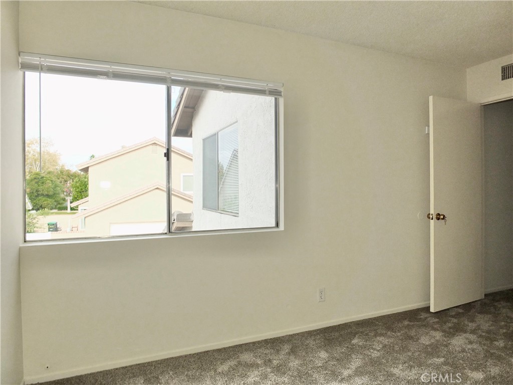14431 Raintree Road Tustin, CA 92780 - Photo 36 of 53 a view of a room that has a large window