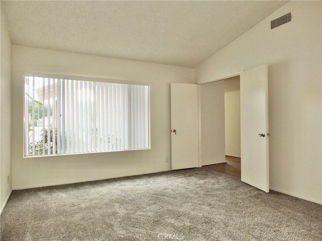 14431 Raintree Road Tustin, CA 92780 - Photo 38 of 53 an empty room with windows