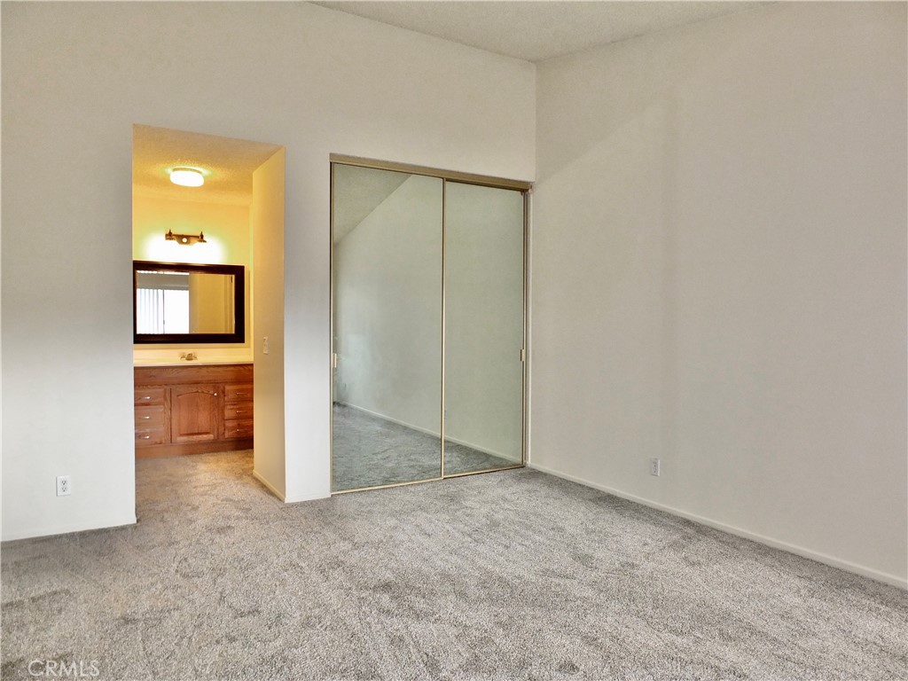 14431 Raintree Road Tustin, CA 92780 - Photo 39 of 53 an empty room with a bathroom