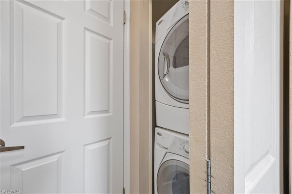 1515 Ruby Lake Point Naples, FL 34114 - Photo 18 of 21 a utility room with dryer and washer