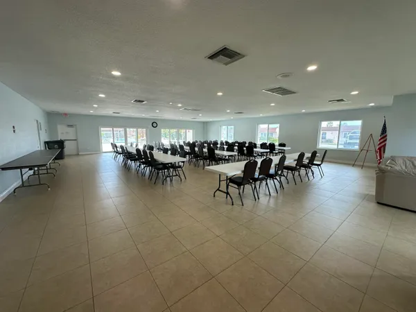 a group of people sitting in a room