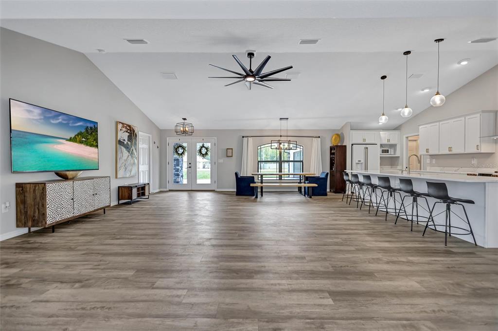 13362 Downy Woodpecker Road Weeki Wachee, FL 34614 - Photo 6 of 26 a view of a livingroom with furniture wooden floor and window