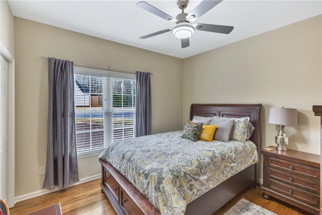101 Riviera Circle Anderson, SC 29621 - Photo 21 of 35 This spacious bedroom offers ample natural light and comfortable wood flooring, creating a relaxing retreat.