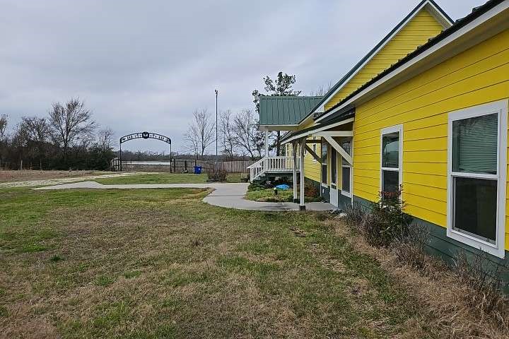 2 Birdwell Road Bedias, TX 77831 - Photo 2 of 11 a view of a house with a yard