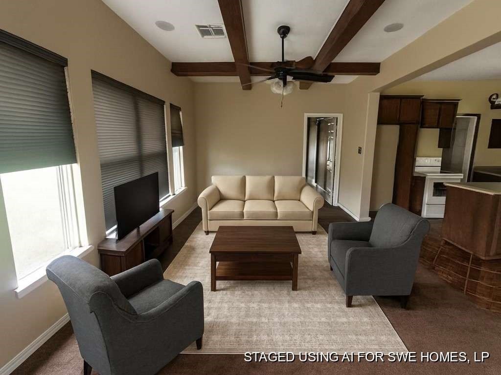 2 Birdwell Road Bedias, TX 77831 - Photo 6 of 13 a living room with furniture and a flat screen tv