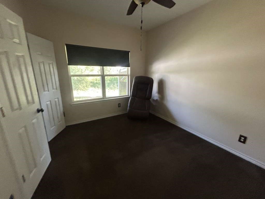 2 Birdwell Road Bedias, TX 77831 - Photo 7 of 11 an empty room with a window
