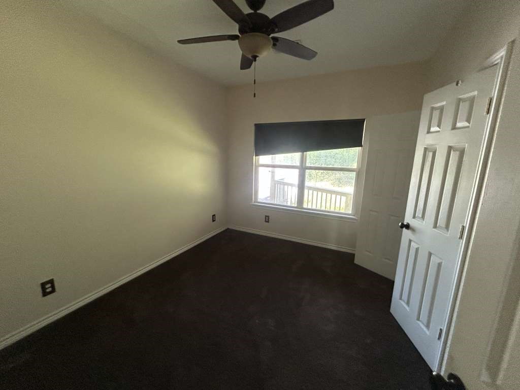 2 Birdwell Road Bedias, TX 77831 - Photo 7 of 13 a view of an empty room with a window