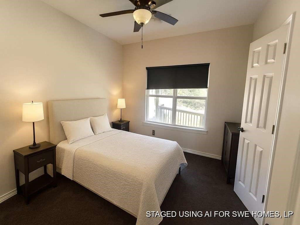2 Birdwell Road Bedias, TX 77831 - Photo 8 of 13 a bedroom with a bed and a window