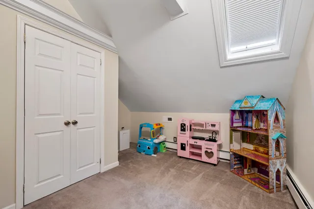 a view of a bedroom with toys and toys