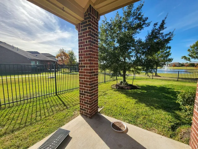 a view of a park with large trees
