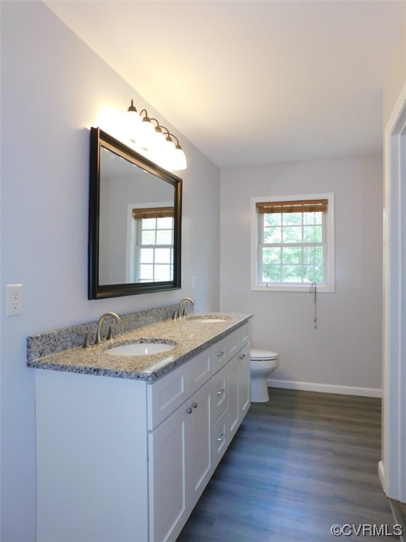 2317 Meherrin Road Meherrin, VA 23954 - Photo 20 of 28 a bathroom with a granite countertop sink and a window