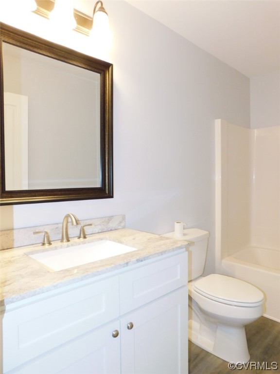 2317 Meherrin Road Meherrin, VA 23954 - Photo 23 of 28 a bathroom with a sink a toilet and mirror