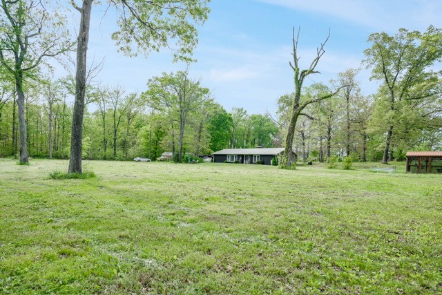 4012 Sango Road Clarksville, TN 37043 - Photo 1 of 22 a backyard of a house with lots of green space
