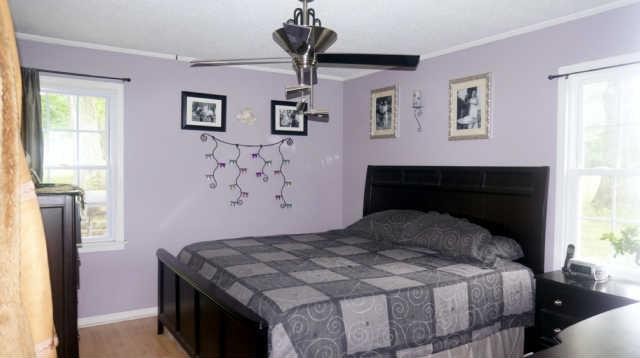4012 Sango Road Clarksville, TN 37043 - Photo 21 of 22 a bedroom with a bed and a window