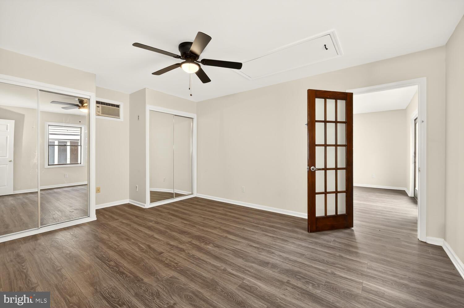6746 Quaker Neck Road Chestertown, MD 21620 - Photo 38 of 50 a view of empty room with wooden floor and fan