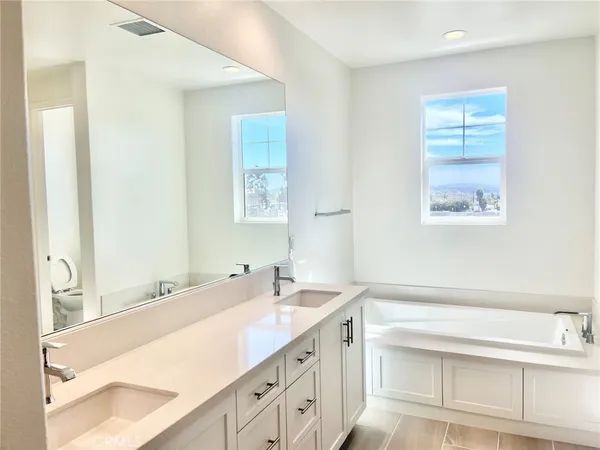 a bathroom with a shower and a toilet
